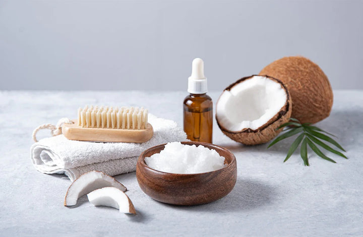 Coconut, comb, napkin and oil bottle | Benefits of Applying Coconut Oil on Face Overnight