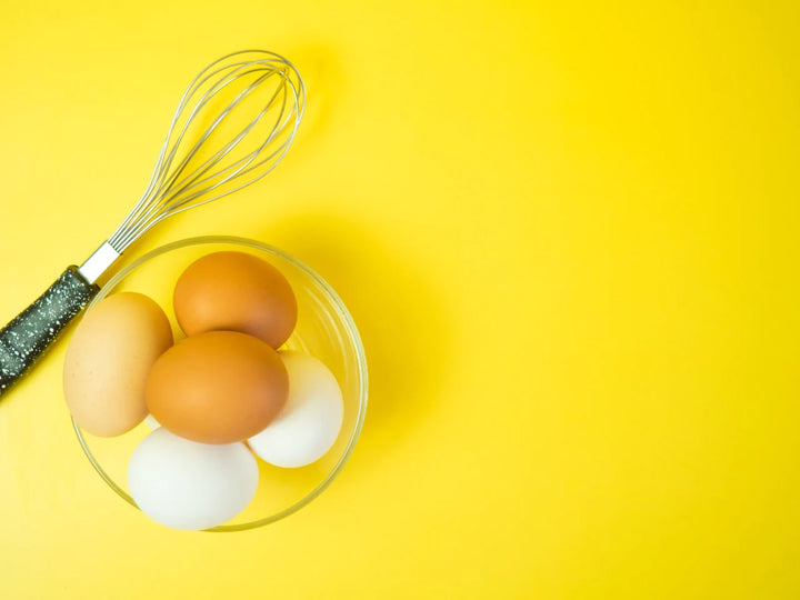 Whisker and eggs kept in bowl | egg face mask