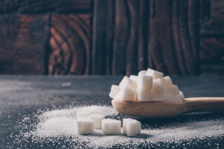 sugar cubes on a spoon