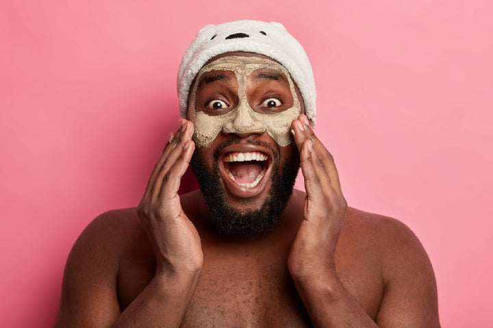 a man applying face wash